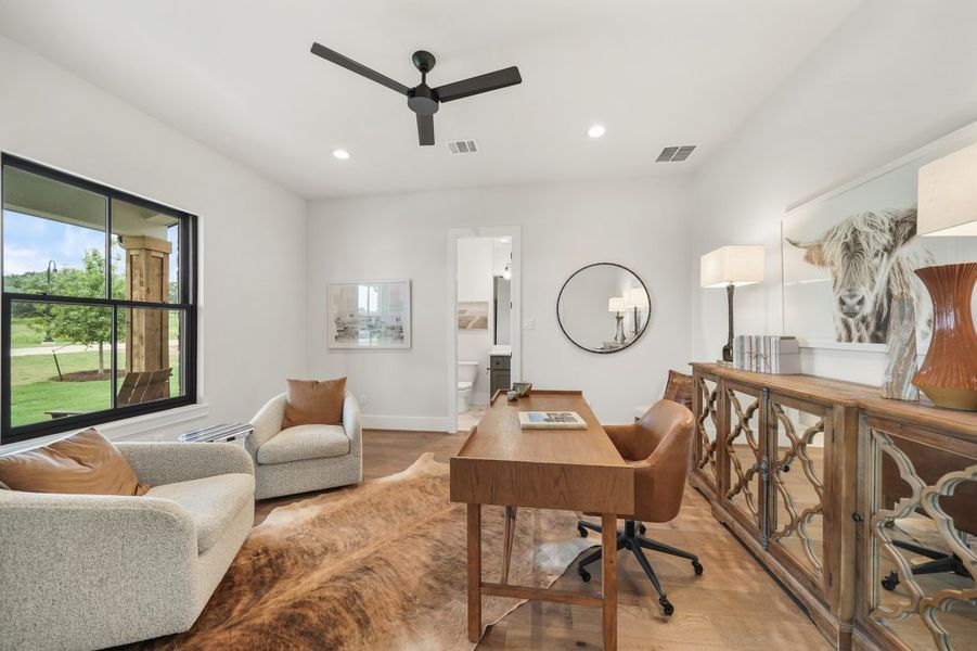 Furnished interior in a model home at Aune Ranch in Copper Canyon (Image 5).
