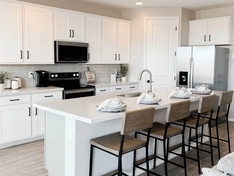 Furnished interior in a model home at Aurora II at Eastmark in Mesa (Image 12). Furnished interior in a model home at Aurora II at Eastmark in Mesa (Image 12).