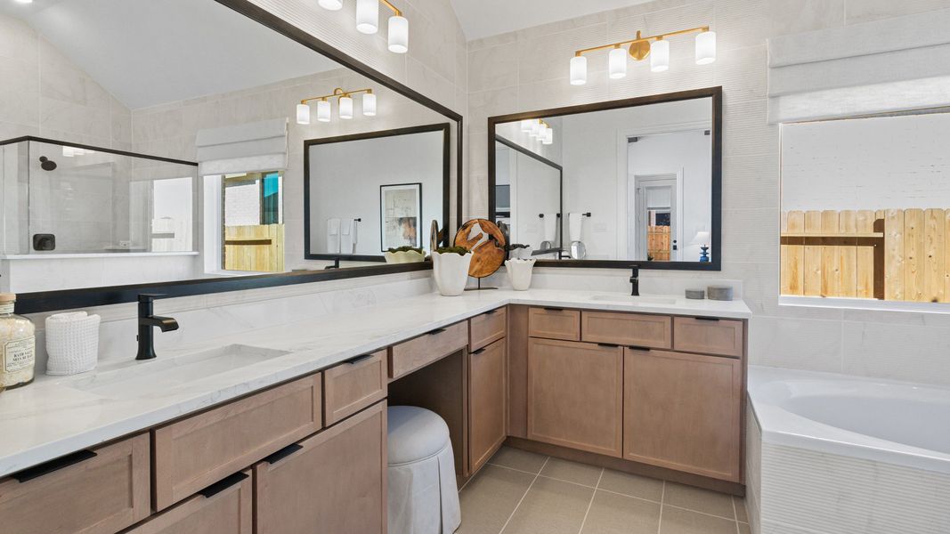 Furnished interior in a model home at Wildrye in Waller (Image 25).