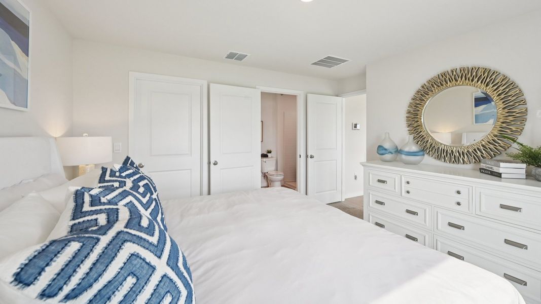 Furnished interior in a model home at Cove at West Port - Express in Port Charlotte (Image 28).