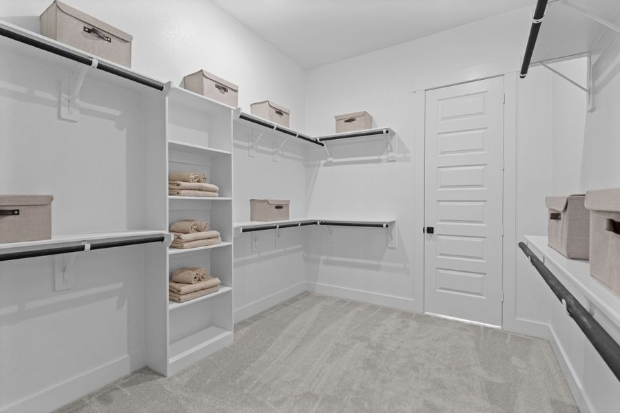 Furnished interior in a model home at Hunters Crossing in Sealy (Image 27).