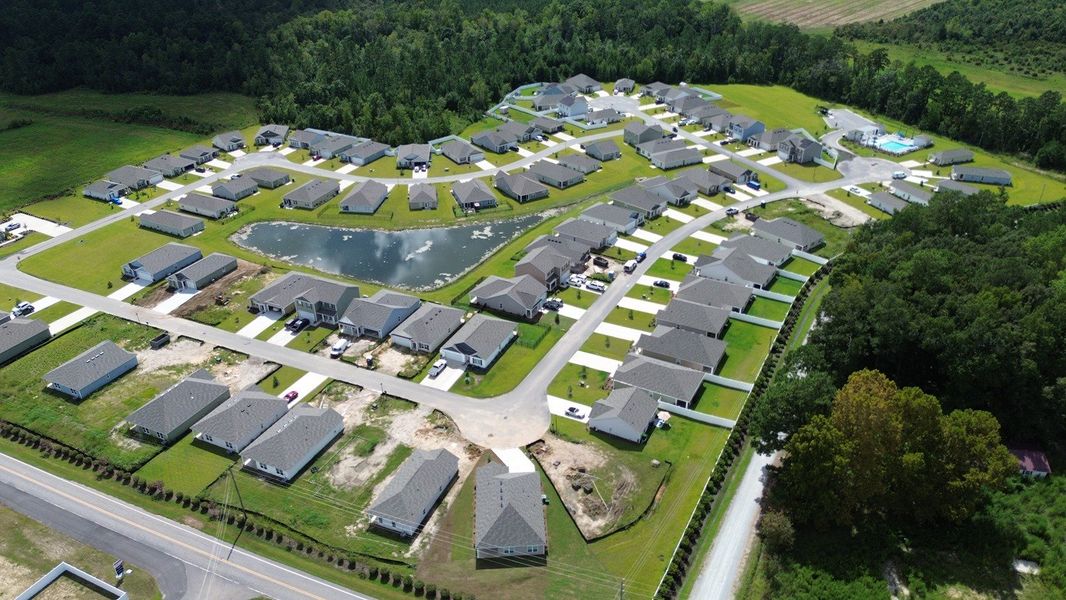 Aerial view of the Cottonwood Place community in Tabor City, NC, showing layout and nearby surroundings (Image 9). Aerial view of the Cottonwood Place community in Tabor City, NC, showing layout and nearby surroundings (Image 9).