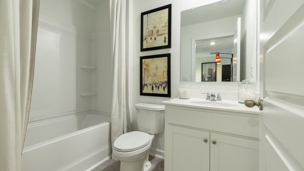 Furnished interior in a model home at Towns at Monroe in Atlanta (Image 24).