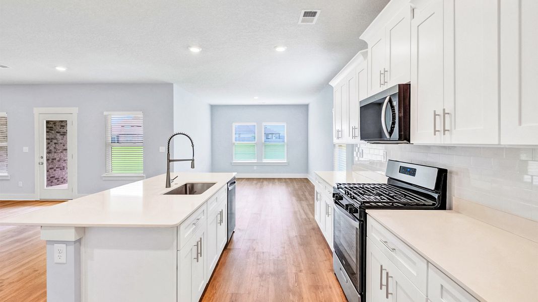 Furnished interior in a model home at Riverwood Gardens in Oakland (Image 11).