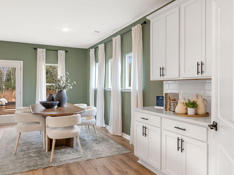 Furnished interior in a model home at Cedar Farms in Winder (Image 9).