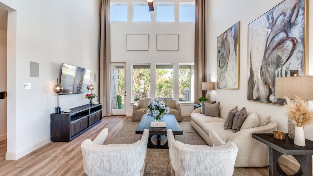 Furnished interior in a model home at Painted Tree - South in McKinney (Image 9).