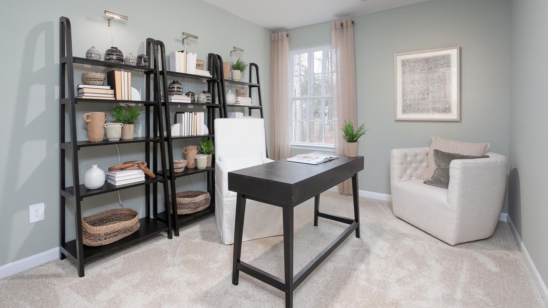 Furnished interior in a model home at The Townes at Riley's Meadow in Haw River (Image 13).