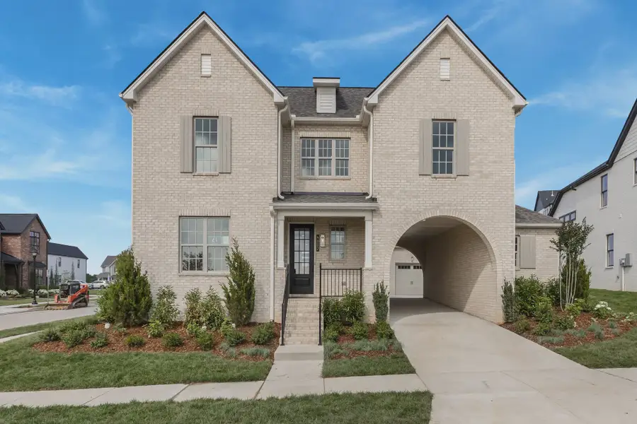 Front exterior of a home in the Poplar Farms community, located in Franklin, TN (Image 3).