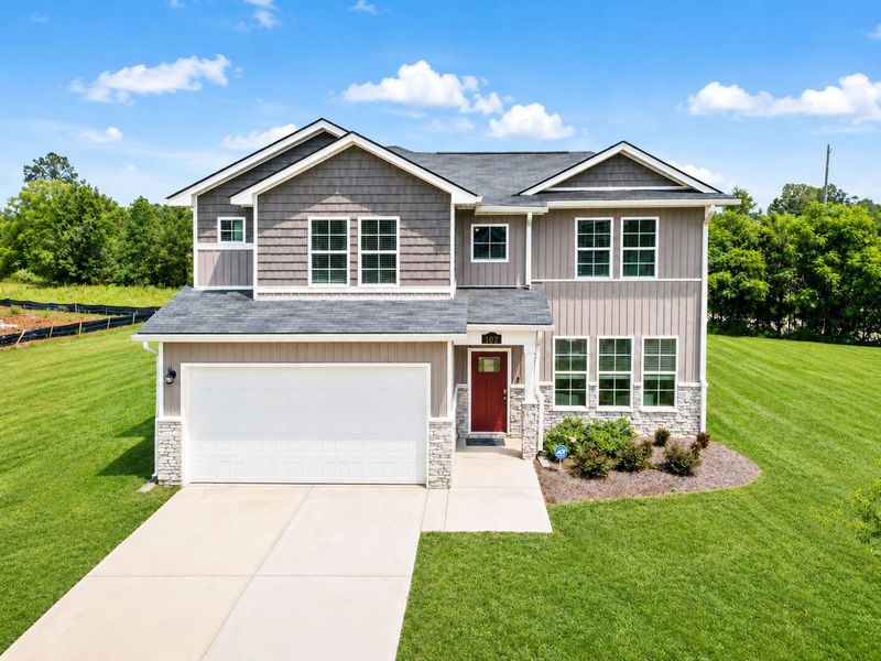 Front exterior of a home in the Ivy Glen community, located in Perry, GA (Image 3). Front exterior of a home in the Ivy Glen community, located in Perry, GA (Image 3).
