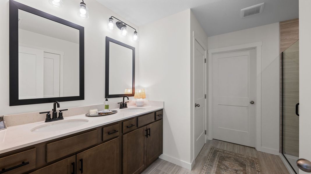 Furnished interior in a model home at Hawks Landing in Apison (Image 40).