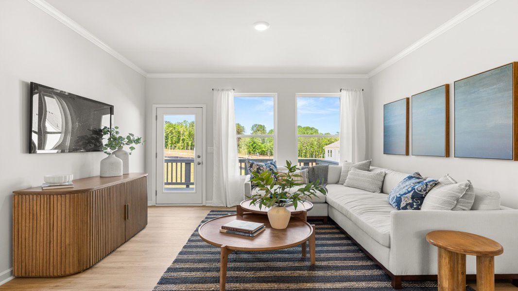 Furnished interior in a model home at Waypoint in Flowery Branch (Image 7).