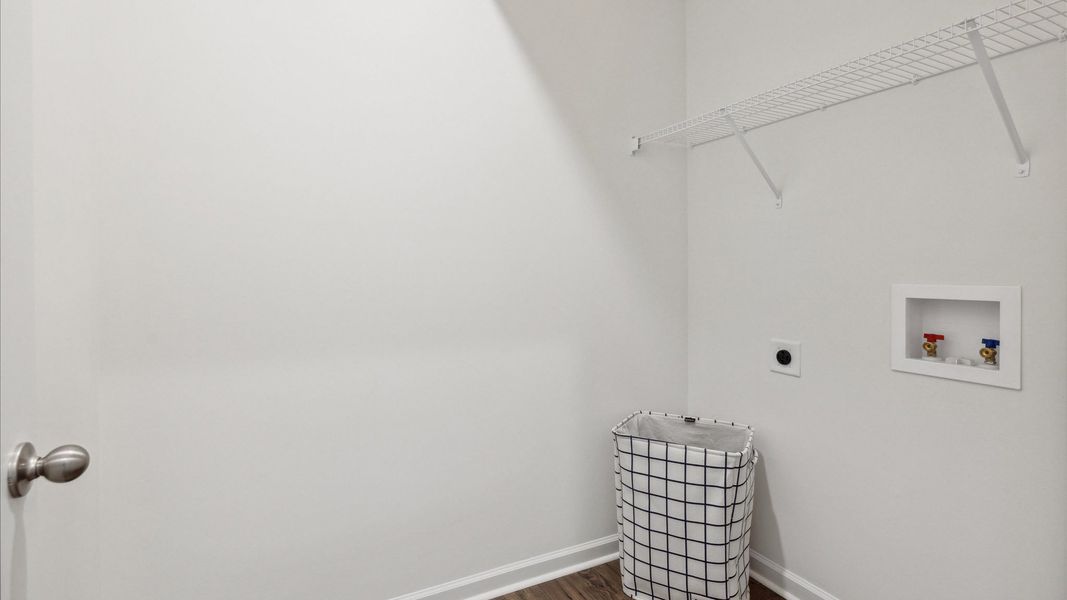 Furnished interior in a model home at The Hideaway at Fox Meadows in Bluff City (Image 26).