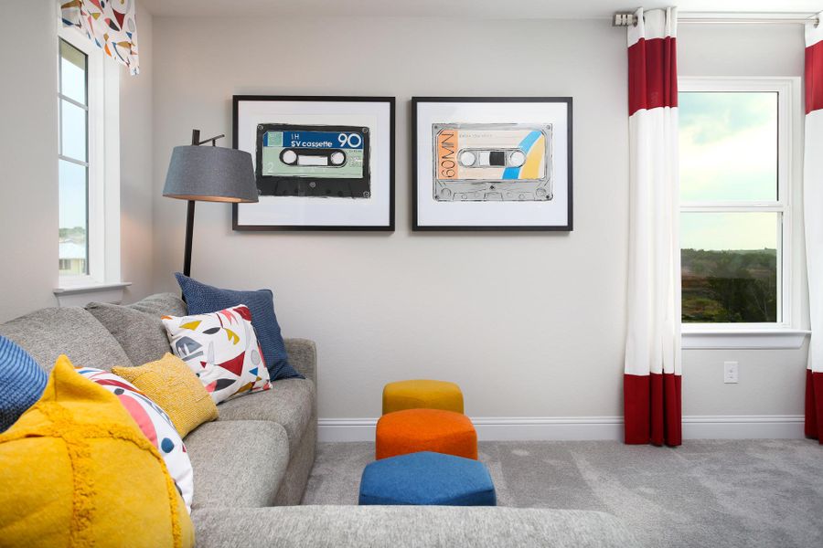 Furnished interior in a model home at Cloverleaf in Austin (Image 64).