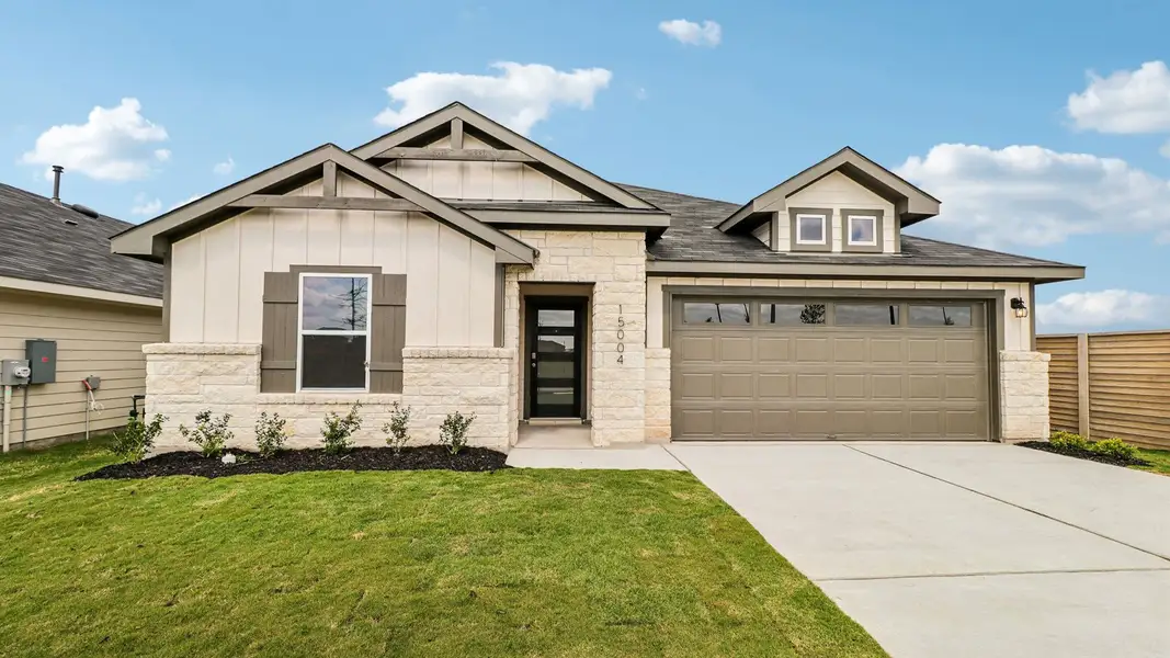 Front exterior of a home in the Monarch Ranch community, located in Manor, TX (Image 4).