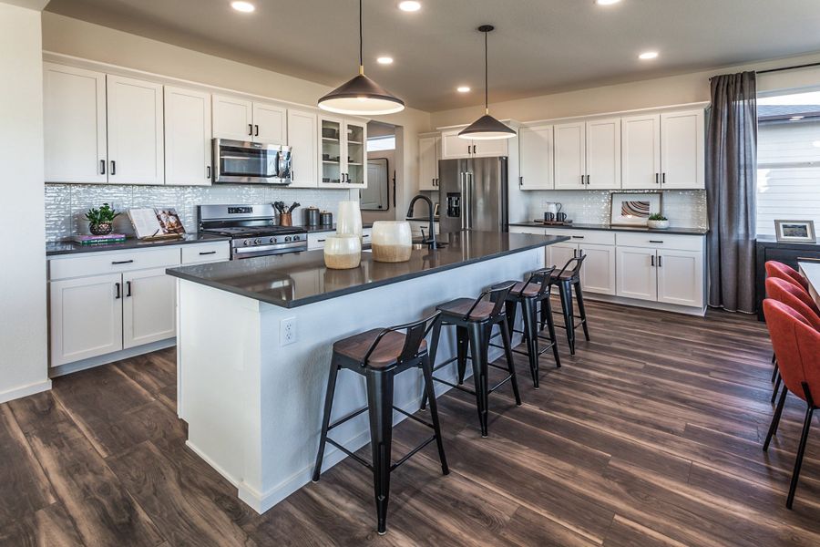 Furnished interior in a model home at Trailside in Timnath (Image 7).