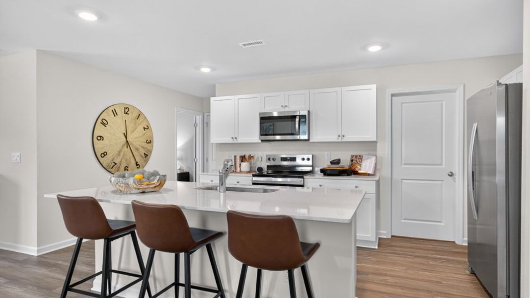 Furnished interior in a model home at Belle Grove in Wendell (Image 9).