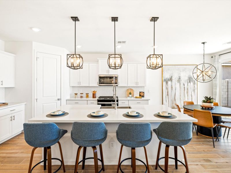Furnished interior in a model home at White Tank Foothills Reserve Series in Waddell (Image 1). Furnished interior in a model home at White Tank Foothills Reserve Series in Waddell (Image 1).