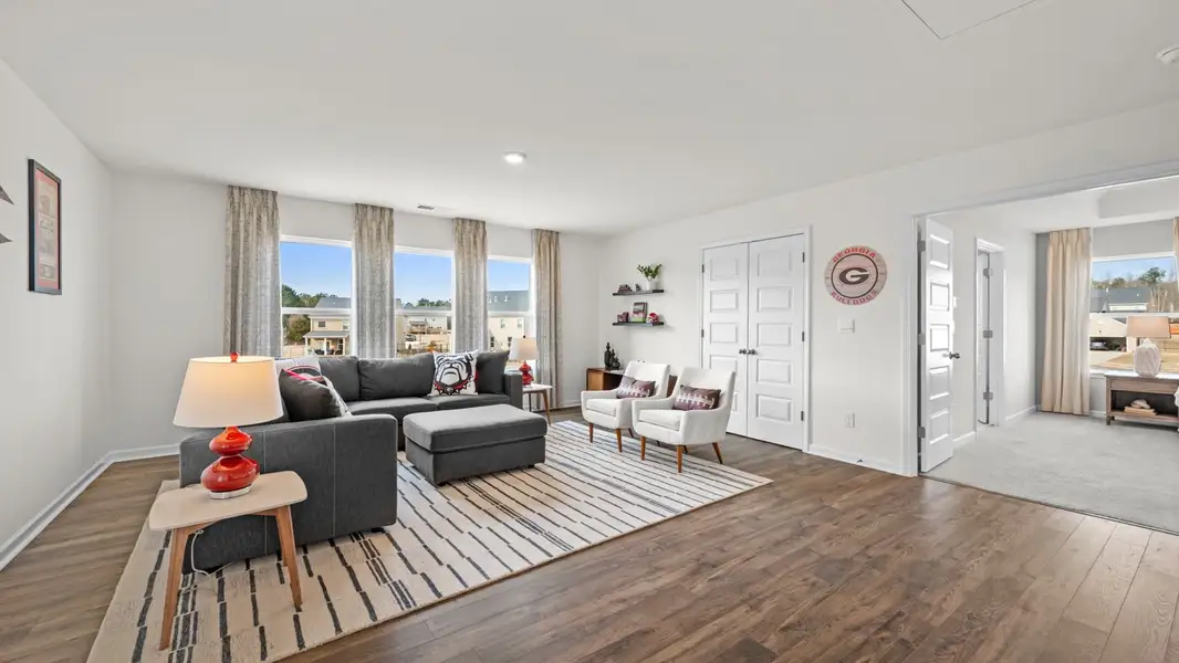 Furnished interior in a model home at Westland in Bogart (Image 9).