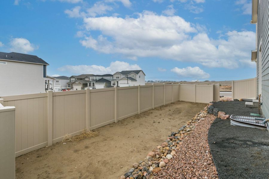 Front exterior of a home in the The Trails at Aspen Ridge – Altitude Collection community, located in Colorado Springs, CO (Image 6).