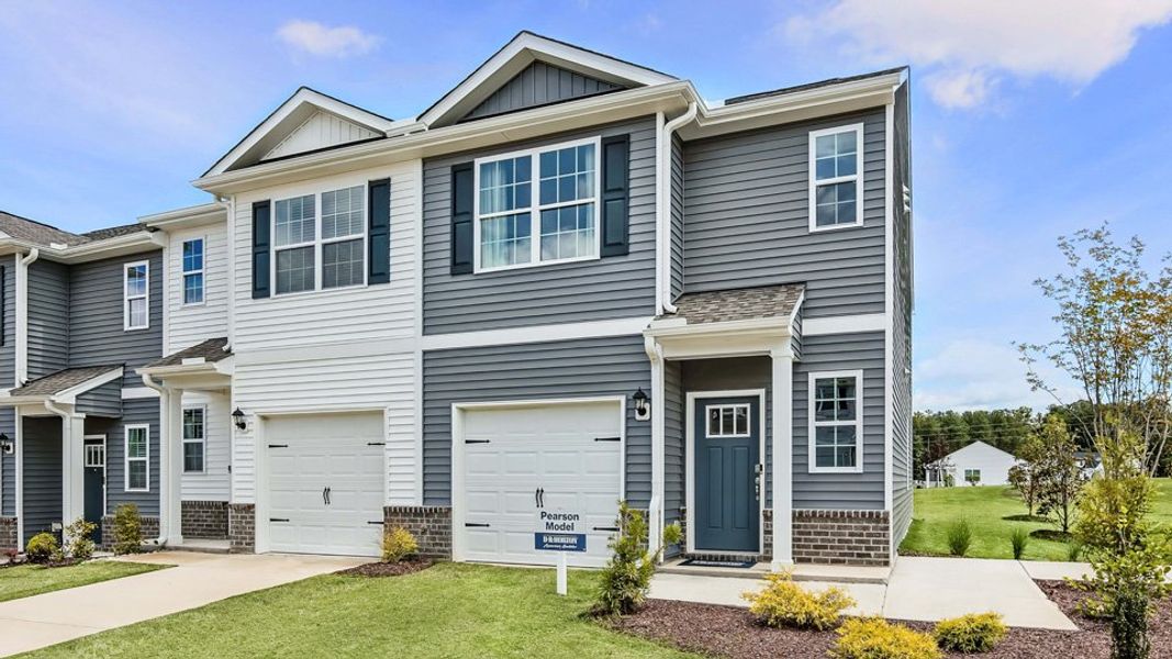 Front exterior of a home in the The Townes at Prestleigh community, located in Wake Forest, NC (Image 5).