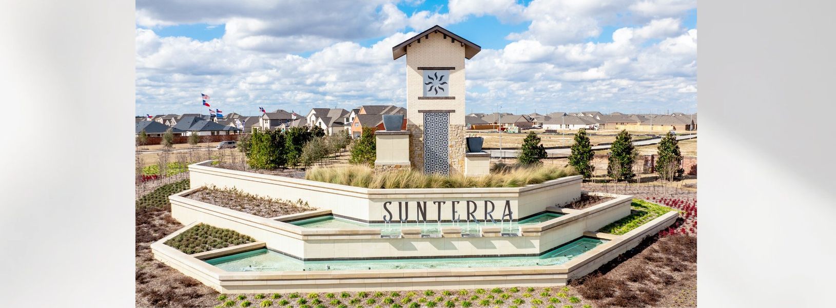 Entrance to the Sunterra community in Katy, TX, featuring signage and landscaping (Image 1).