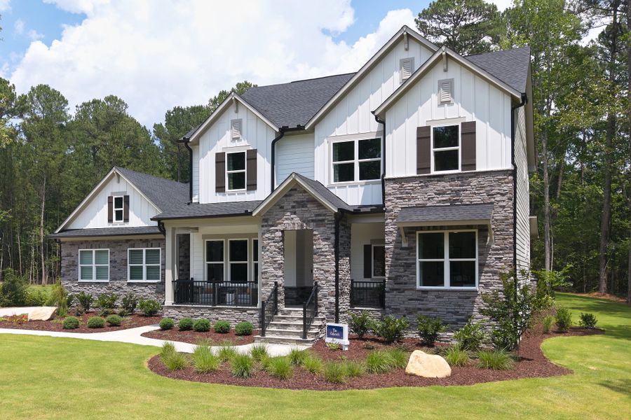 Front exterior of a home in the Flatiron Forest community, located in Pittsboro, NC (Image 1). Front exterior of a home in the Flatiron Forest community, located in Pittsboro, NC (Image 1).