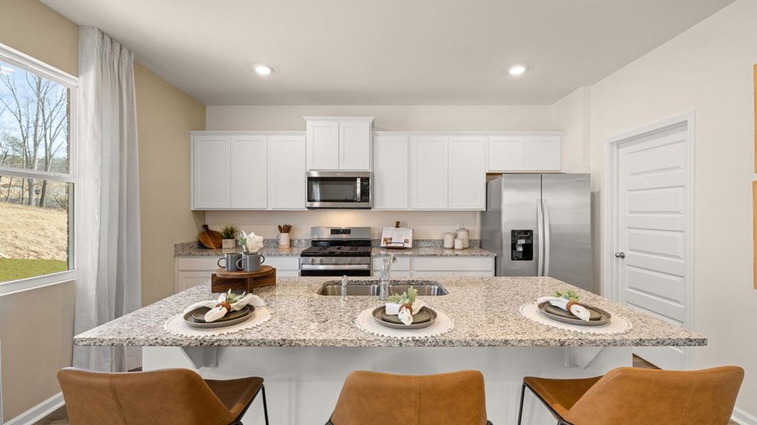 Furnished interior in a model home at Brooks Village in Dacula (Image 7).