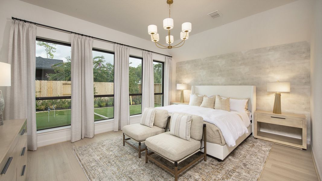Furnished interior in a model home at The Highlands 65' in Porter (Image 18).