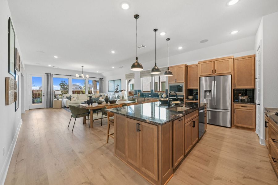 Furnished interior in a model home at Chaparral Park in Oak Point (Image 9).