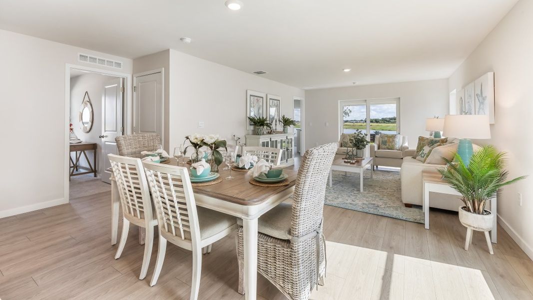 Furnished interior in a model home at Cali Cove in Punta Gorda (Image 16).