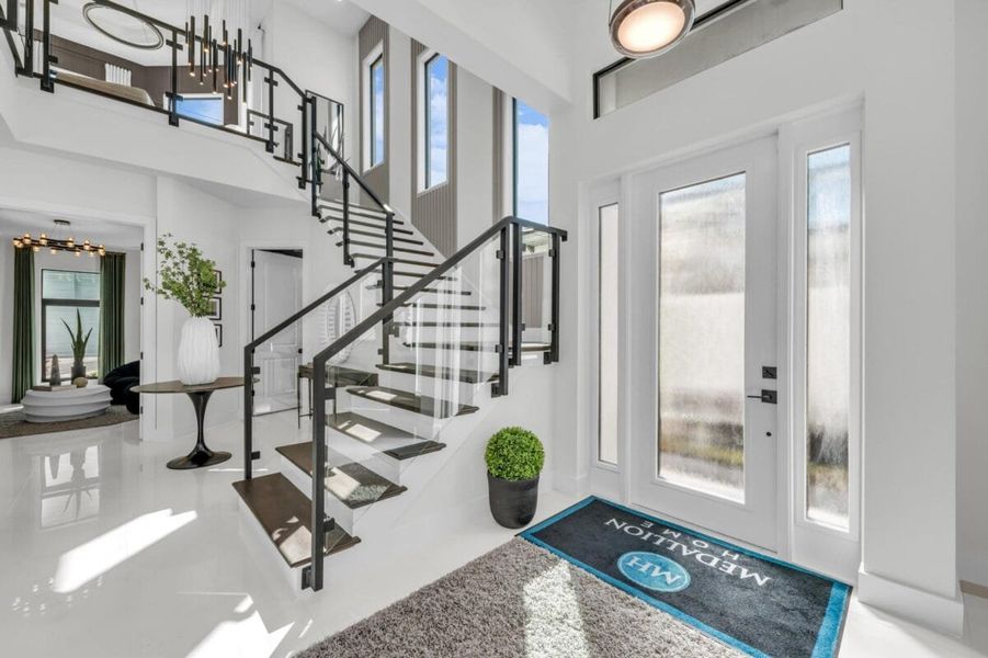 Furnished interior in a model home at Aqua in Bradenton (Image 230).