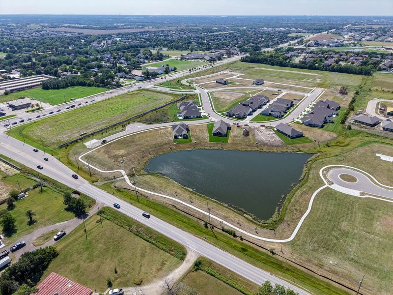 Aerial view of the The Courtyards at Cornerstone community in Andover, KS, showing layout and nearby surroundings (Image 5). Aerial view of the The Courtyards at Cornerstone community in Andover, KS, showing layout and nearby surroundings (Image 5).