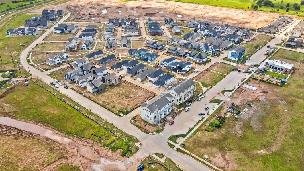Aerial view of the Indigo: 40ft. lots community in Richmond, TX, showing layout and nearby surroundings (Image 19). Aerial view of the Indigo: 40ft. lots community in Richmond, TX, showing layout and nearby surroundings (Image 19).