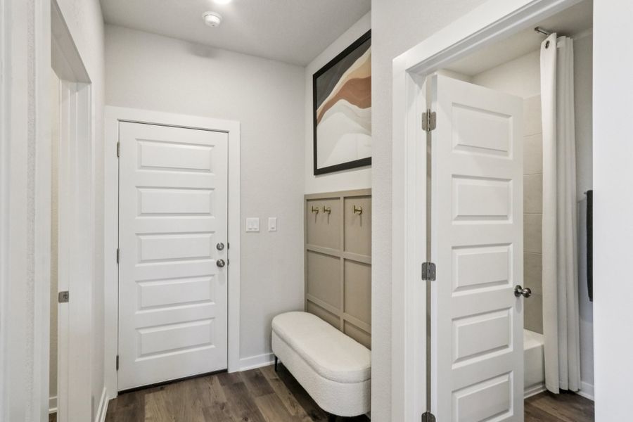 A bathroom with white doors. A bathroom with white doors.