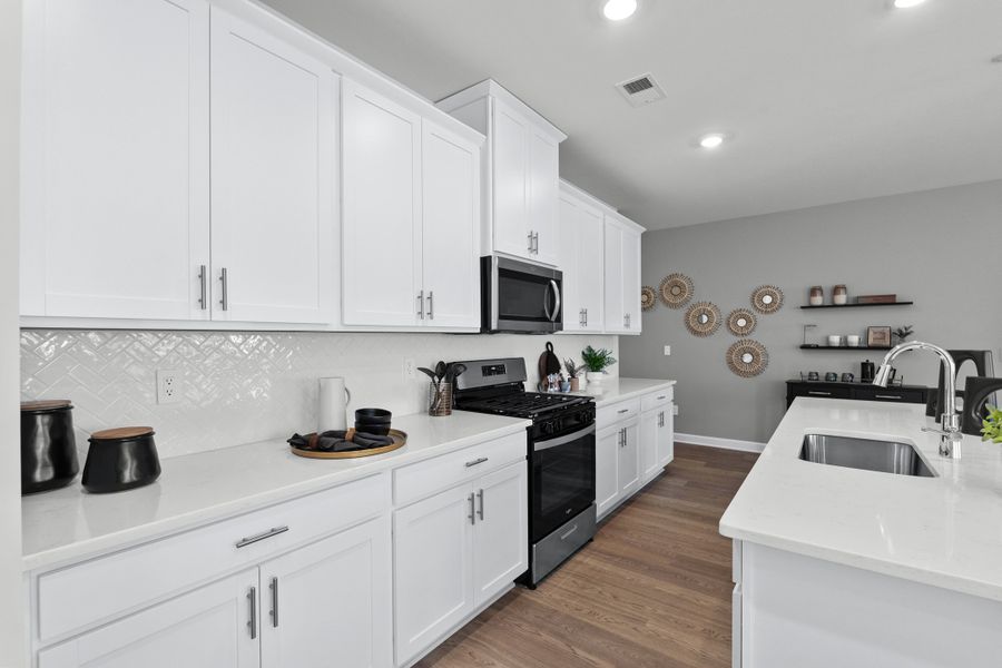 Furnished interior in a model home at Crown Pointe in Georgetown (Image 7).