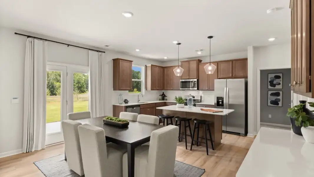 Furnished interior in a model home at Enclave at Stonewall Tell in South Fulton (Image 7).