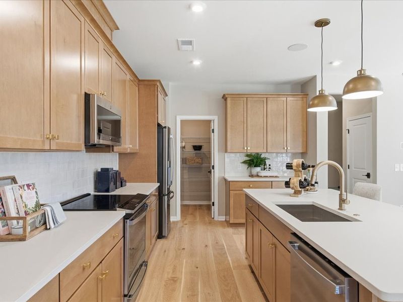 Furnished interior in a model home at Ellis Townes in Charlotte (Image 25).