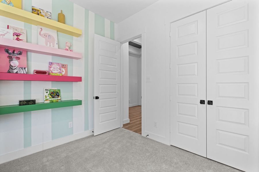 Furnished interior in a model home at Hunters Crossing in Sealy (Image 19).