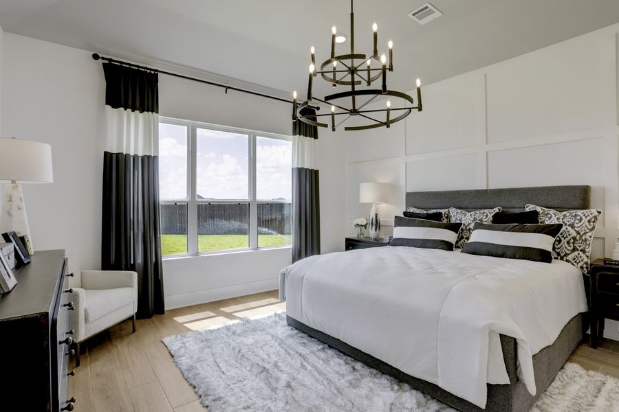 Furnished interior in a model home at Sunterra (Katy ISD) in Katy (Image 13).