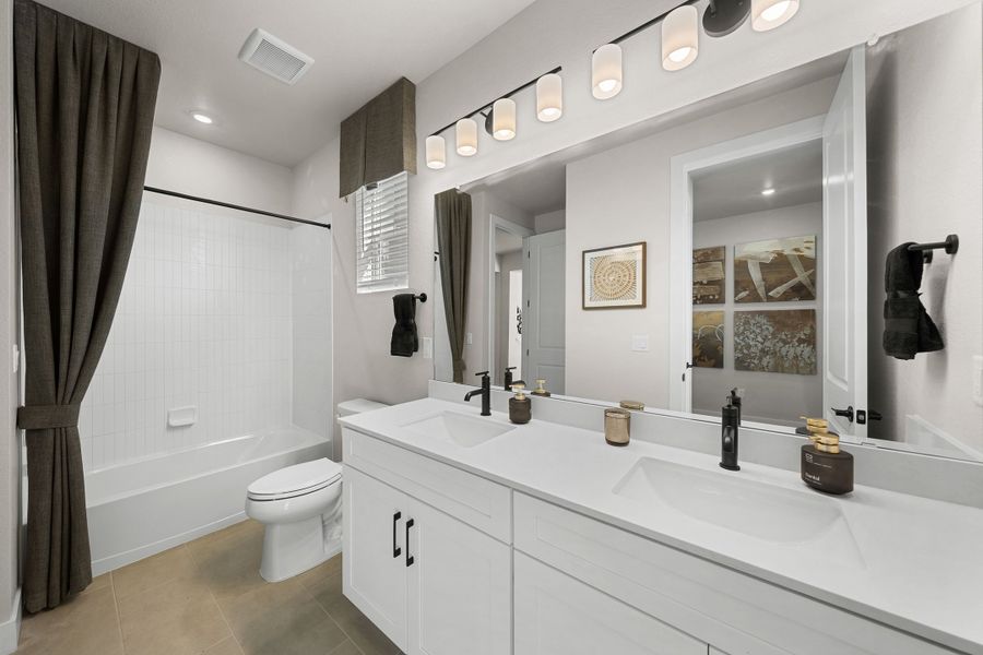 Furnished interior in a model home at Trumark Homes at Tanterra in Parker (Image 51).