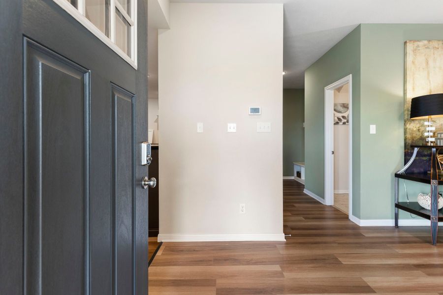 Furnished interior in a model home at Heartland at Creek Meadows in College Station (Image 3).