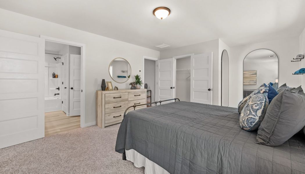 Furnished interior in a model home at Rosewood Lake Preserve in Hoschton (Image 33).