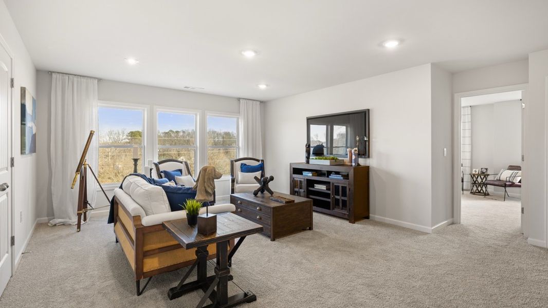 Furnished interior in a model home at Thalley Creek Estates in Cumming (Image 17).