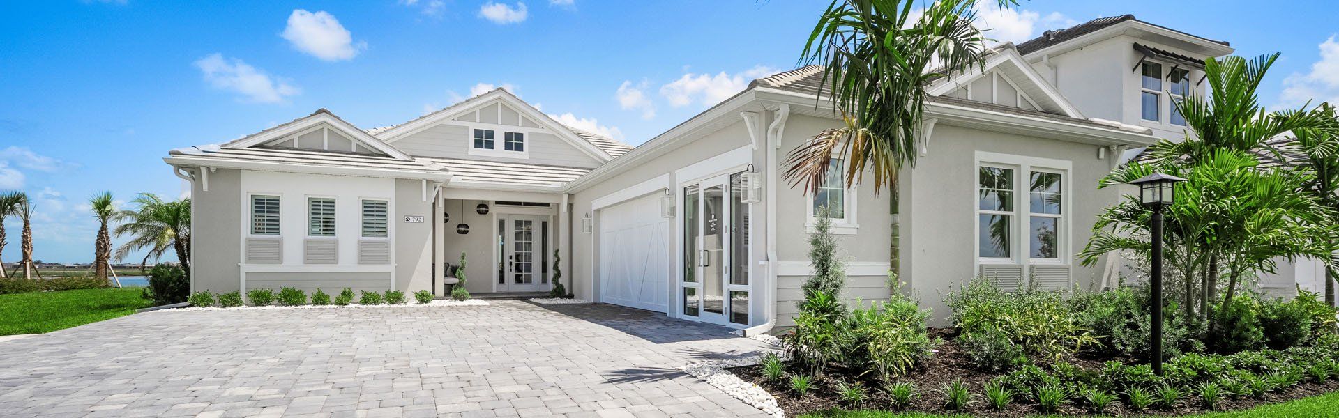 Front exterior of a home in the Shellstone at Waterside community, located in Sarasota, FL (Image 4).