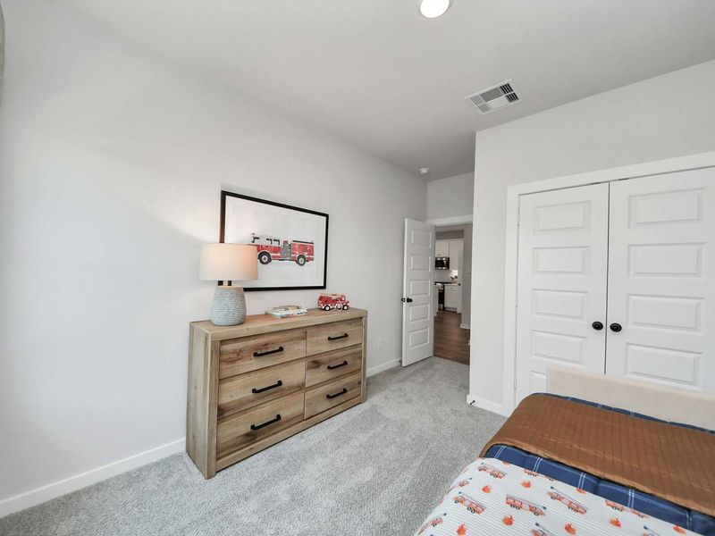 Furnished interior in a model home at Enclave at Newport in Crosby (Image 18).