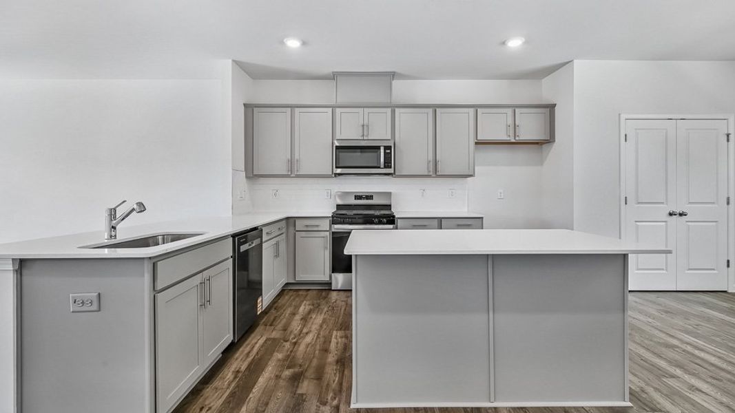 Furnished interior in a model home at The Townes Park in Apex (Image 26). Furnished interior in a model home at The Townes Park in Apex (Image 26).
