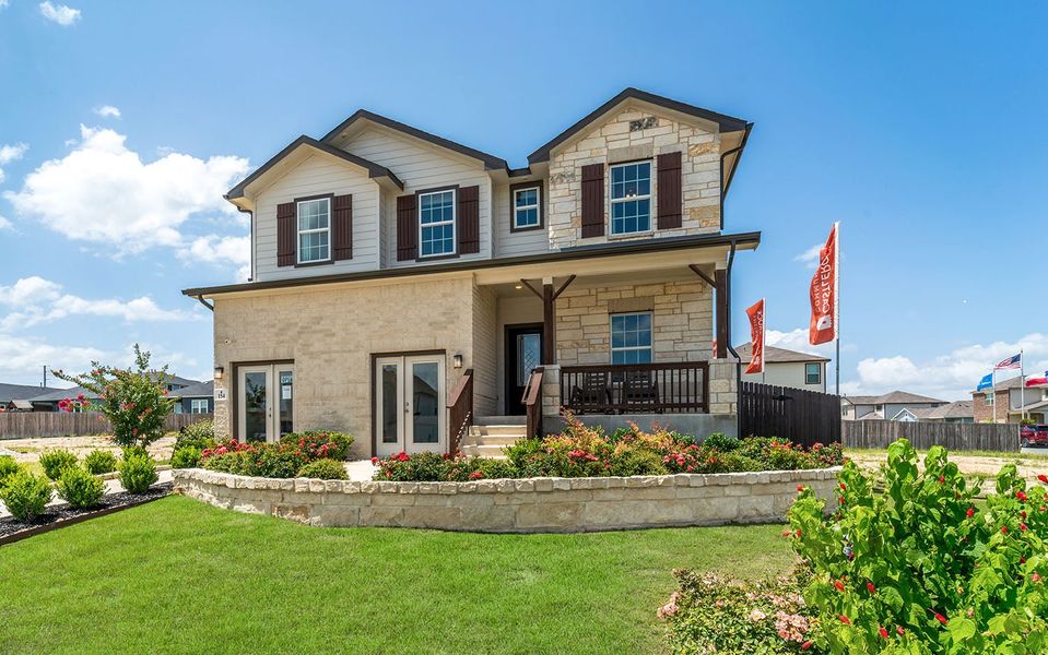 Front exterior of a home in the Hunter's Ranch community, located in San Antonio, TX (Image 9).