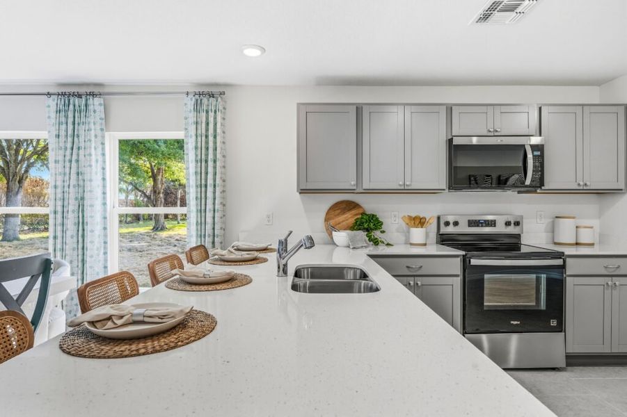 Furnished interior in a model home at Spanish Lakes in Port St. Lucie (Image 10).