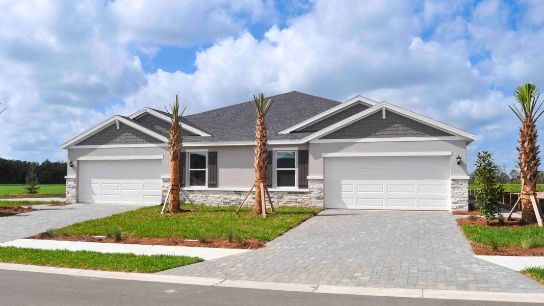 Front exterior of a home in the Legacy Preserve community, located in Parrish, FL (Image 13). Front exterior of a home in the Legacy Preserve community, located in Parrish, FL (Image 13).