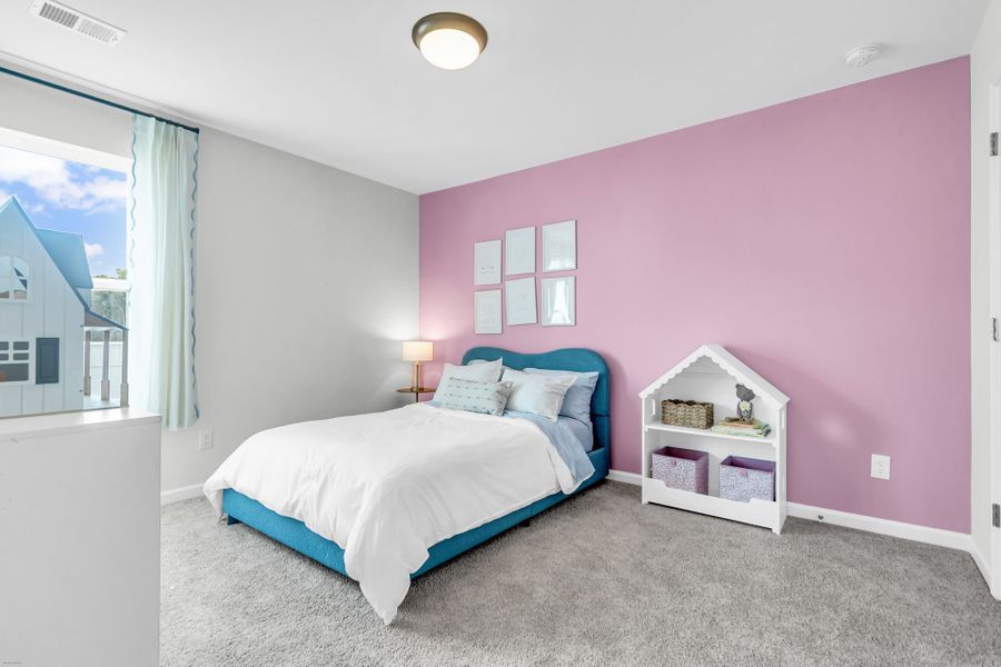 Furnished interior in a model home at Reeves Crossing in St. George (Image 16).